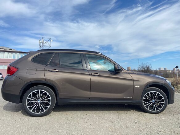 2012 BMW X1 20d I (E84), коричневый, 1100000 рублей - вид 2