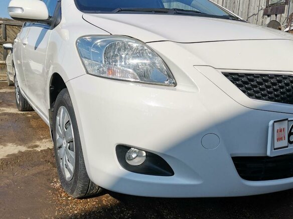 2010 Toyota Belta I, белый, 825000 рублей - вид 16