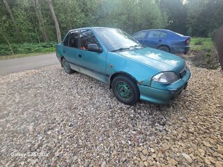 2001 Suzuki Swift II Рестайлинг, зелёный, 60000 рублей, вид 2