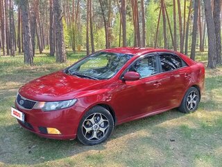2011 Kia Cerato 6-speed II, красный, 749000 рублей, вид 2