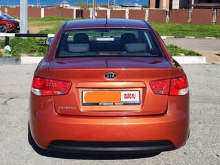 2011 Kia Cerato 6-speed II, оранжевый, 850000 рублей, вид 2