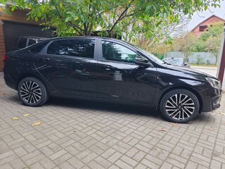 2024 Lada (ВАЗ) Aura, чёрный, 1700000 рублей, вид 4