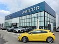 2012 Opel Astra GTC J Рестайлинг, жёлтый - вид 2