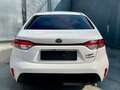 2022 Toyota Corolla Sporty XII (E210) Рестайлинг, белый, 1600000 рублей - вид 3