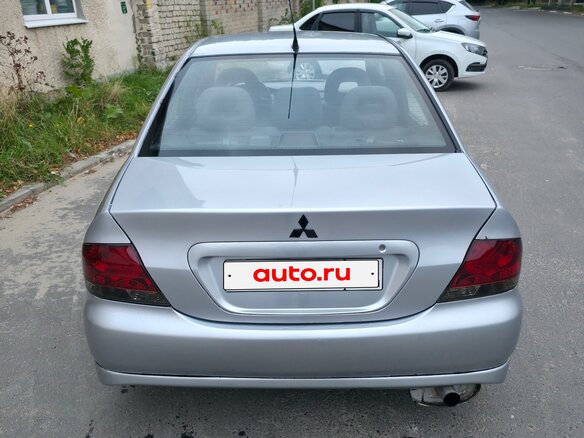 2004 Mitsubishi Lancer IX, серебристый, 335000 рублей - вид 2