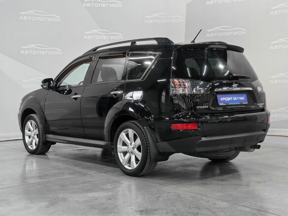2012 Mitsubishi Outlander II Рестайлинг, чёрный, 1430000 рублей - вид 2