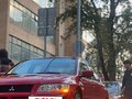 2001 Mitsubishi Lancer Evolution VII, красный - вид 1