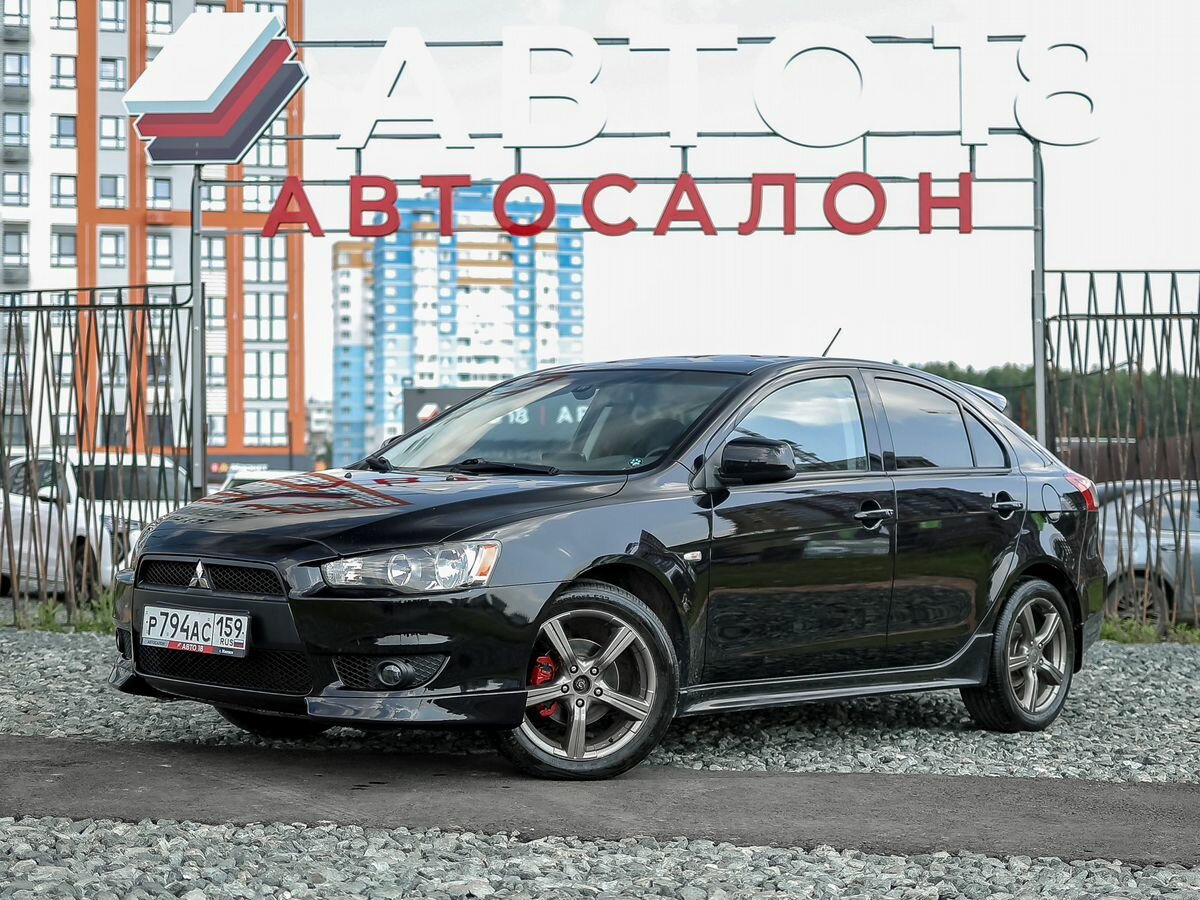 Открыть фотографии: Mitsubishi Lancer X