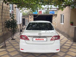 2011 Toyota Corolla X (E140, E150) Рестайлинг, белый, 600000 рублей, вид 3