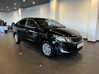 2014 Kia Rio 4-speed III, чёрный, 711000 рублей, вид 1
