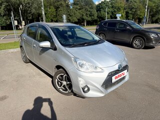 2016 Toyota Aqua I Рестайлинг, серебристый, 750000 рублей, вид 2