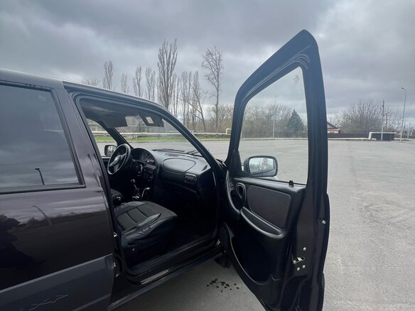 2013 Chevrolet Niva I Рестайлинг, коричневый, 550000 рублей - вид 9