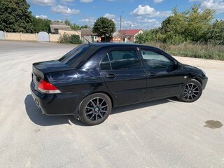 2005 Mitsubishi Lancer IX Рестайлинг, чёрный, 335000 рублей, вид 4