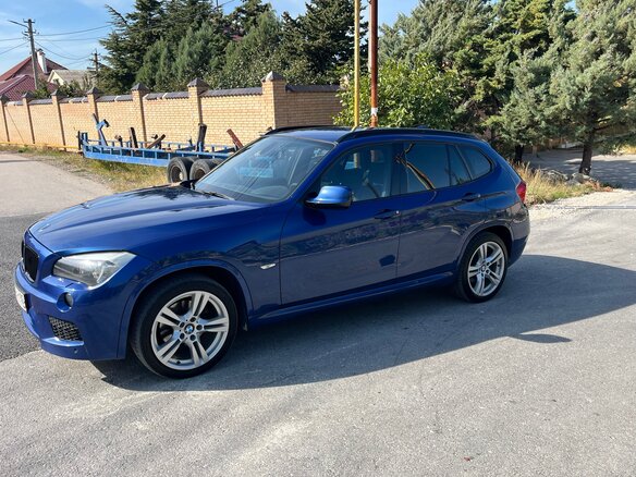 2011 BMW X1 20d I (E84), синий, 1330000 рублей - вид 4