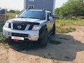 2012 Nissan Navara (Frontier) III (D40) Рестайлинг, белый, 2000000 рублей - вид 1