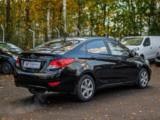 2013 Hyundai Solaris I, чёрный, 635000 рублей, вид 2