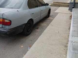 1994 Nissan Primera I (P10), серый, 70000 рублей, вид 2