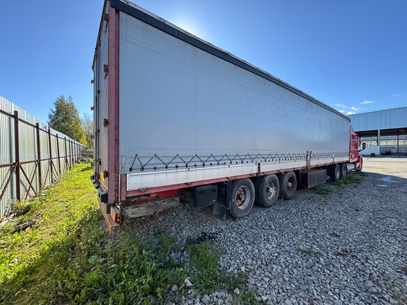 1999 Schmitz Cargobull S01, красный, 1100000 рублей - вид 2