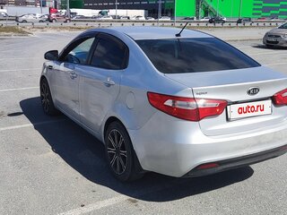 2012 Kia Rio 5-speed III, серебристый, 670000 рублей, вид 4