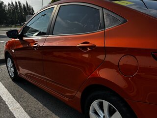 2014 Hyundai Solaris I Рестайлинг, оранжевый, 950000 рублей, вид 4