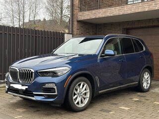 2020 BMW X5 45e IV (G05/G18), синий, 6490000 рублей, вид 1
