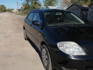 2003 Toyota Corolla IX (E120, E130), чёрный, 509000 рублей, вид 3