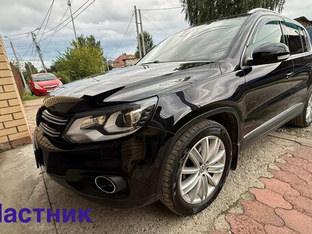 2014 Volkswagen Tiguan I Рестайлинг, чёрный, 1500000 рублей, вид 1