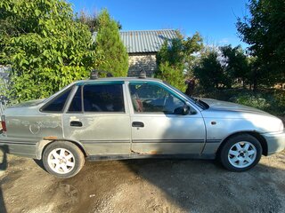 2004 Daewoo Nexia I, серебристый, 70000 рублей, вид 2