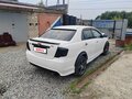 2007 Toyota Corolla Axio X (E140, E150), белый, 570000 рублей - вид 6