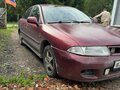 1998 Mitsubishi Carisma I, красный - вид 1