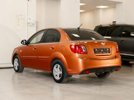 2011 Kia Rio II Рестайлинг, оранжевый, 750000 рублей, вид 4