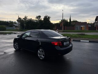 2008 Toyota Corolla AMT X (E140, E150), чёрный, 700000 рублей, вид 2