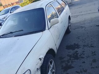 2000 Toyota Corolla VII (E100), белый, 140000 рублей, вид 2