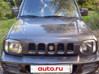 2011 Suzuki Jimny III Рестайлинг 1, чёрный, 1400000 рублей, вид 4
