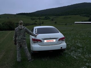 2013 Nissan Almera III (G15), белый, 600000 рублей, вид 2