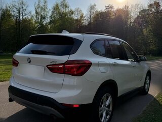 2018 BMW X1 18i sDrive II (F48), белый, 1623000 рублей, вид 4