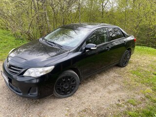 2011 Toyota Corolla X (E140, E150) Рестайлинг, чёрный, 950000 рублей, вид 1