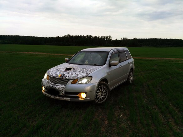 2003 Mitsubishi Airtrek I, серебристый - вид 2