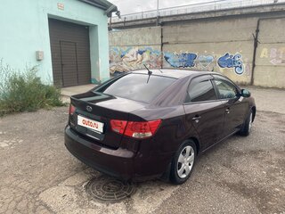 2011 Kia Cerato 6-speed II, пурпурный, 820000 рублей, вид 2