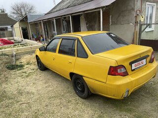 2013 Daewoo Nexia I Рестайлинг, жёлтый, 270000 рублей, вид 4