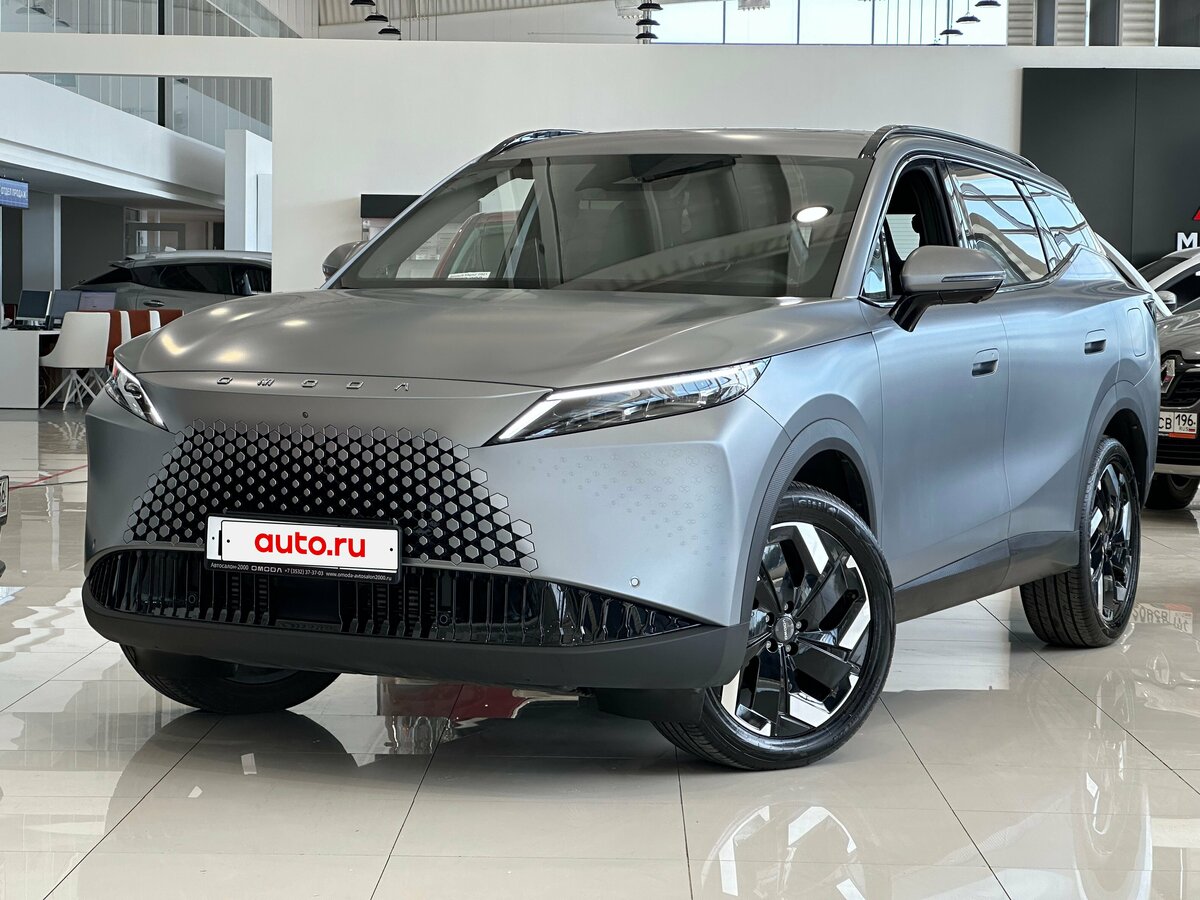Открыть фотографии: Omoda C7
