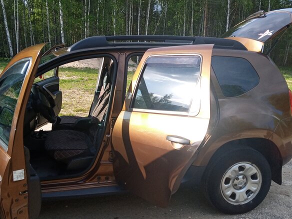 2012 Renault Duster I, коричневый, 900000 рублей - вид 2