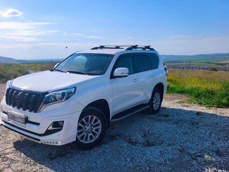 2013 Toyota Land Cruiser Prado 150 Series Рестайлинг 1, белый, 3200000 рублей, вид 1