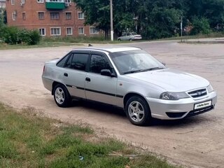 2011 Daewoo Nexia I Рестайлинг, серебристый, 240000 рублей, вид 3