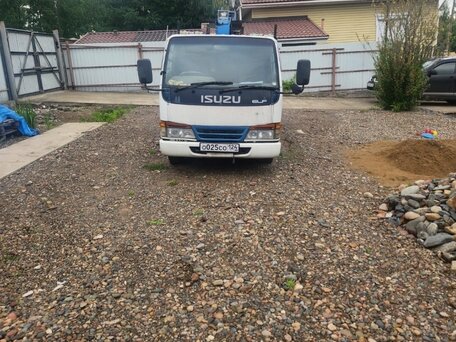 1990 Isuzu Elf (N-series), белый, 2450000 рублей, вид 2