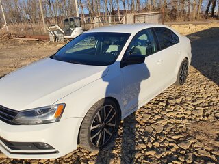 2016 Volkswagen Jetta VI Рестайлинг, белый, 1550000 рублей, вид 4