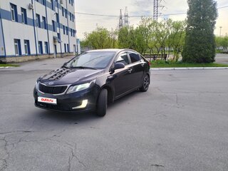 2012 Kia Rio 4-speed III, чёрный, 650000 рублей, вид 1