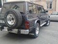 1993 Nissan Patrol IV (Y60), серый - вид 3