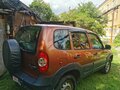 2018 Chevrolet Niva I Рестайлинг, коричневый, 740000 рублей - вид 1