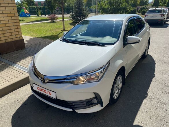2016 Toyota Corolla XI (E160, E170, E180) Рестайлинг 1, белый, 1395000 рублей - вид 1